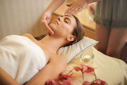  Woman having a facial after understanding collagen production and skin elasticity. 