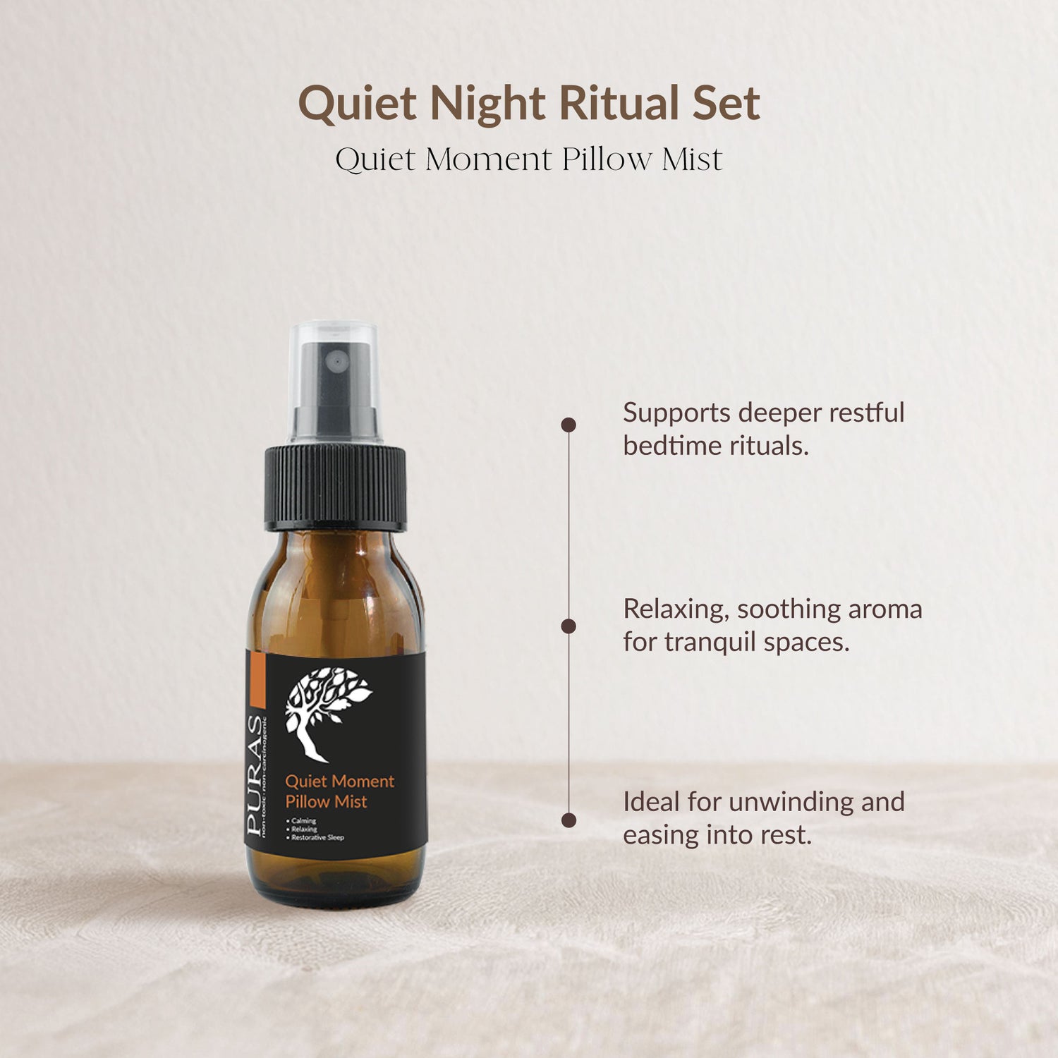 An amber glass spray bottle labeled PURAS Quiet Moment Pillow Mist, shown on a light beige textured surface against a matching background with descriptive text about its calming bedtime ritual benefits.