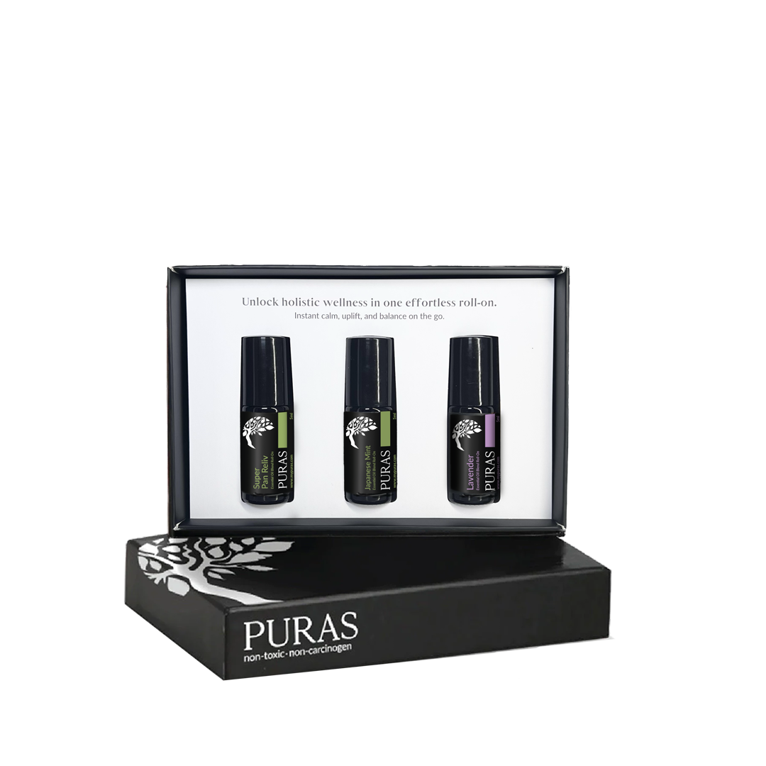 Puras non-toxic skin care roller-on set in a black presentation box, featuring three small black bottles with green and purple labels on a white insert card, with the main black box displayed in front on a white background.
