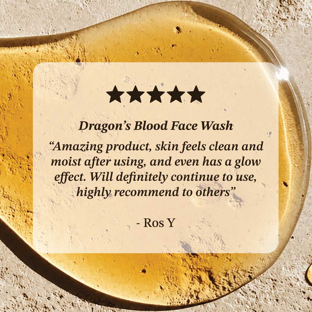 Dragon's Blood Face Wash with a five-star rating and review on a textured surface