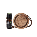 Essential oil bottle with wooden diffuser on a white background